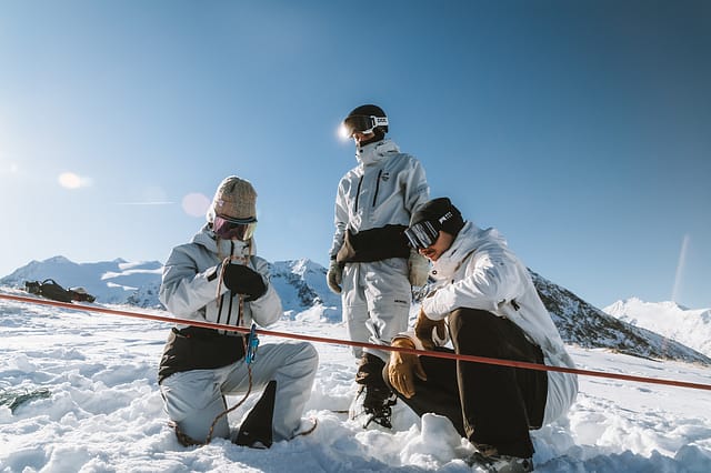Max highlights avalanche safety gear—beacon, probe, and shovel—as essential.